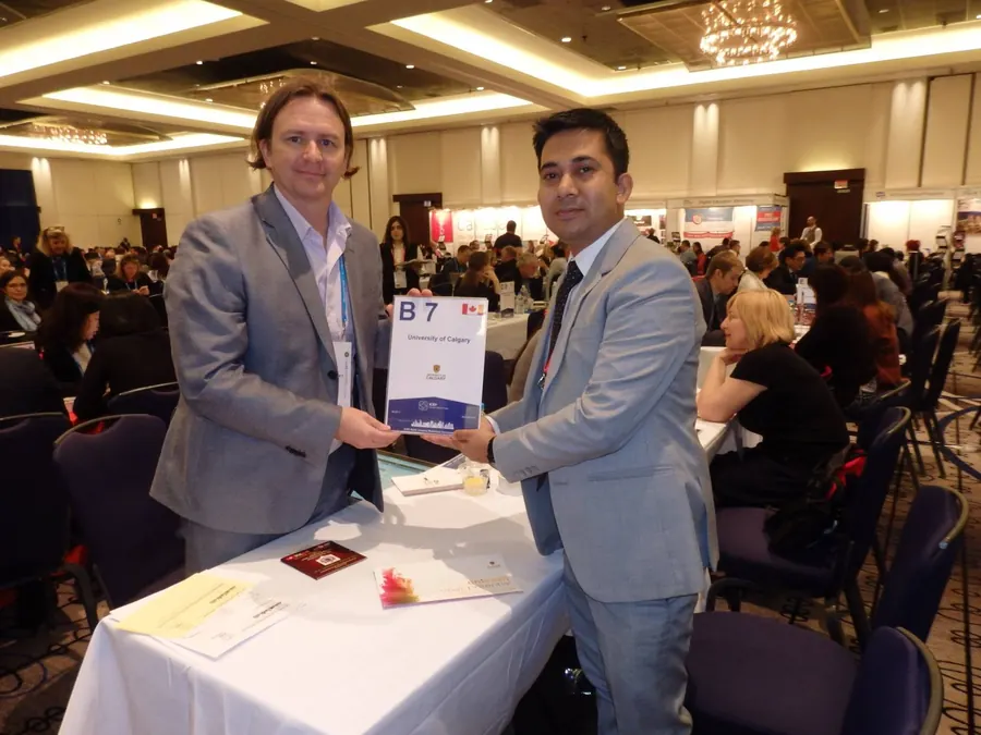 Meeting at the University of Calgary table, ICEF North America Workshop Vancouver