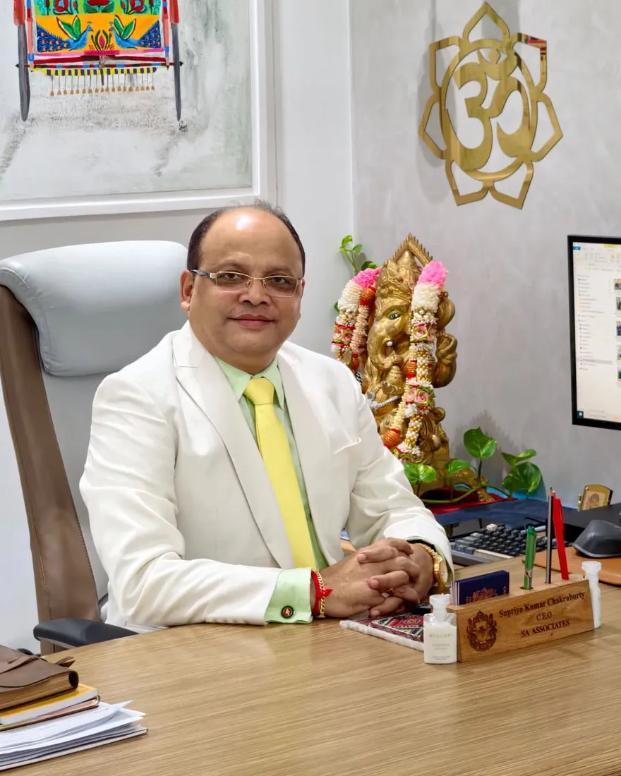 Supriya K. Chakraborty, Founder & CEO of SA Associates, at his desk