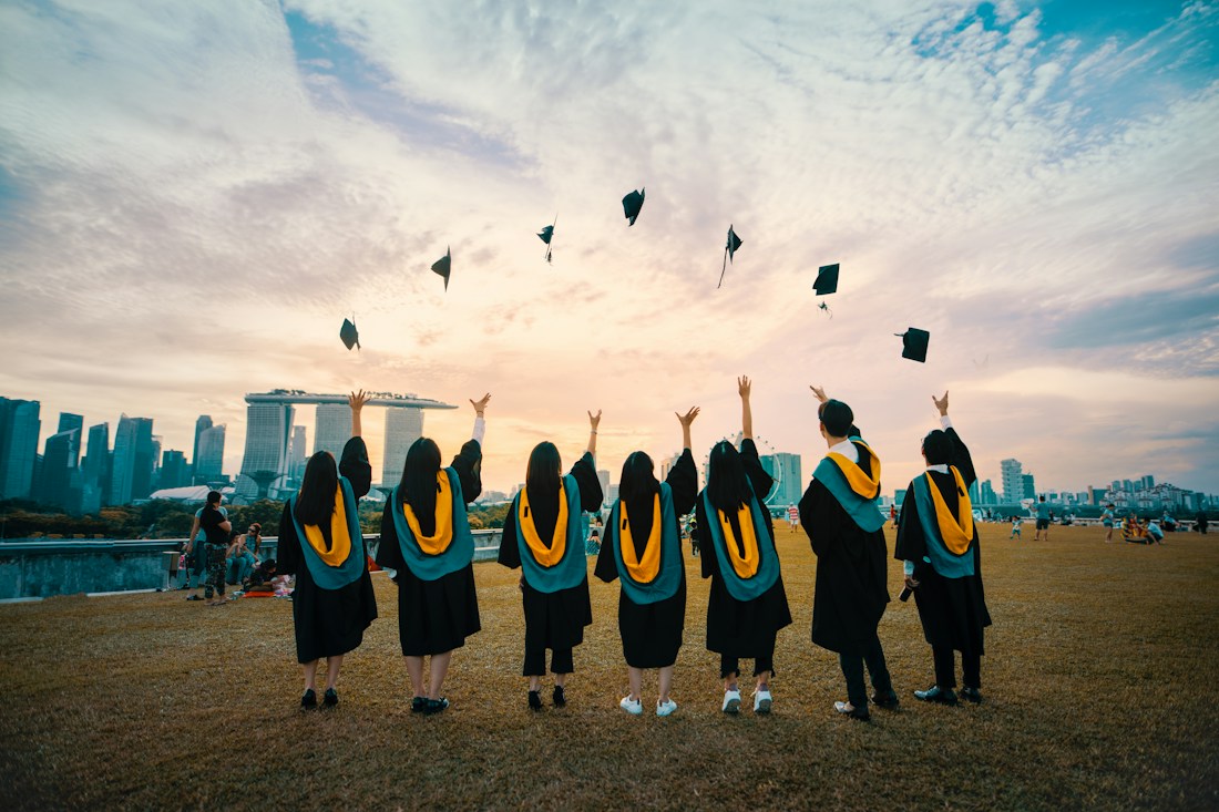 Happy international students on university campus